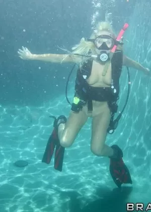 Arousing blonde diver Angelina Ashe enjoys a hard underwater fucking