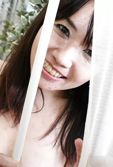 Naughty asian MILF strips down and gets her hairy slit fingered