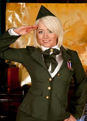 Mature blonde army lady in stockings takes off her uniform and lingerie