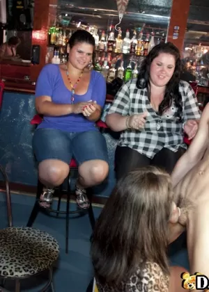 Young malestripper gets pawed at and sucked on by party girls