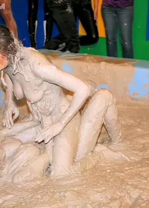 Seductive fetish gals with petite tits are into messy mud wrestling