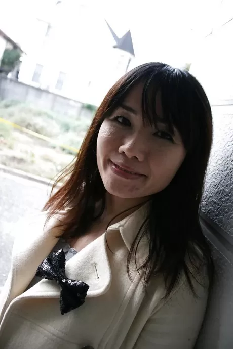 Naughty asian MILF strips down and gets her hairy slit fingered