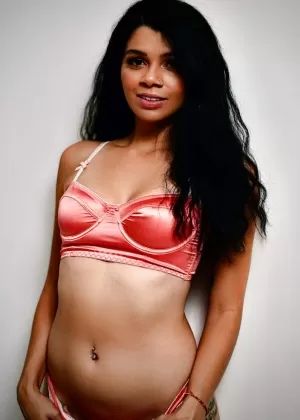 Three females take turns modelling their pretties during SFW action