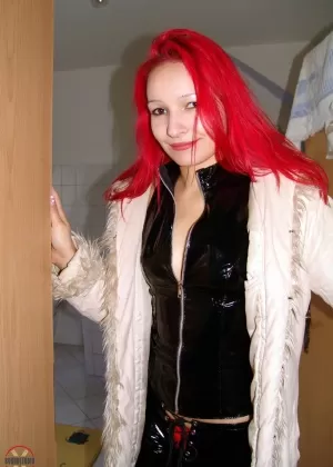 Solo girl with dyed hair Tkbaby practices self bondage in a home dungeon