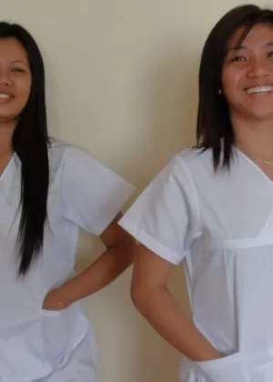 Asian nurses Joanna  Joy drop their pants for a hairy pussy threesome