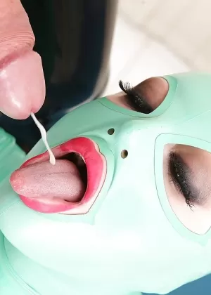 European rubber freak Latex Lucy taking cumshot on tongue after blowjob